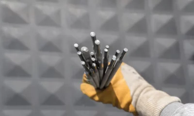 welding rods held in hand