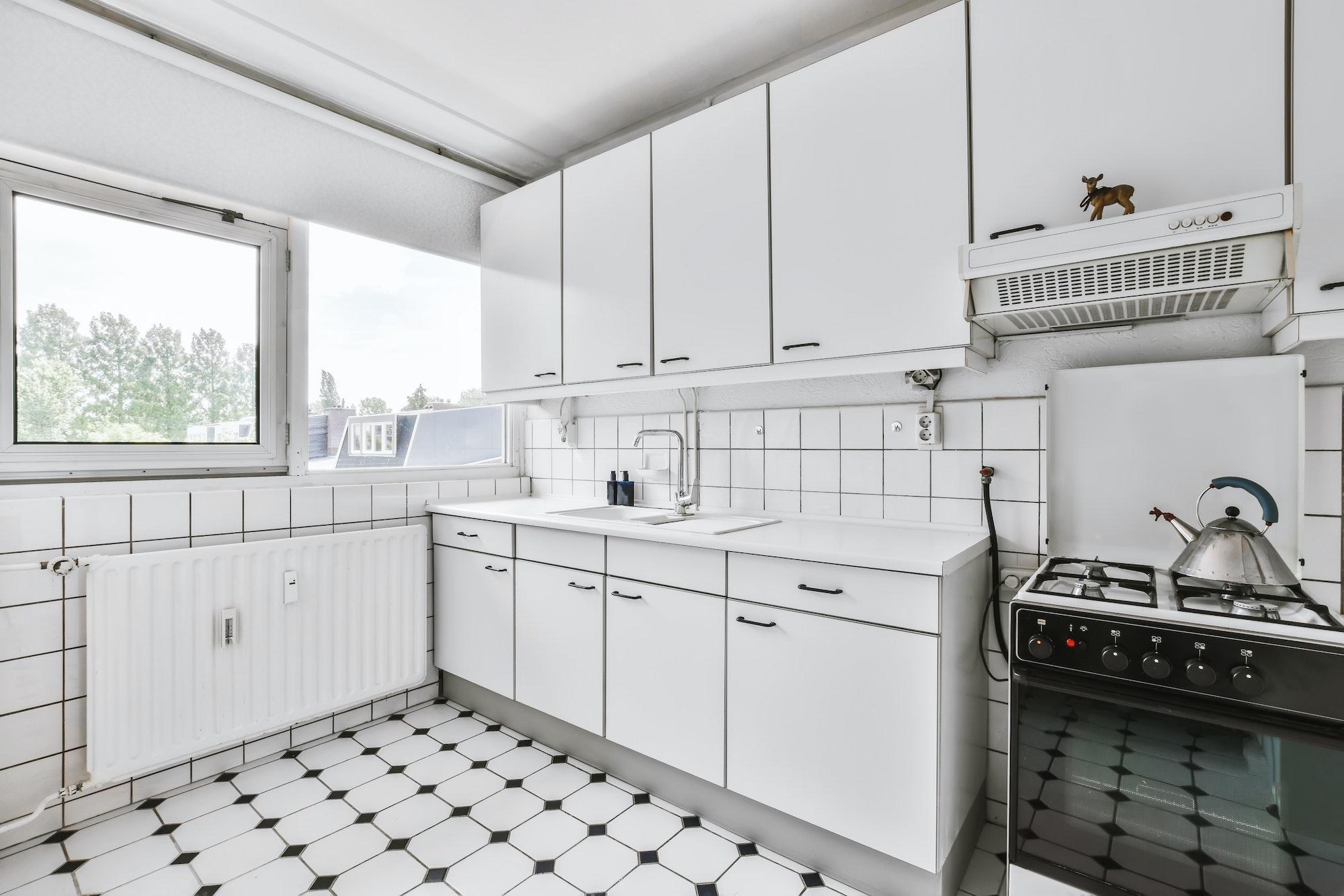 Beautiful kitchen area with hanging cabinet